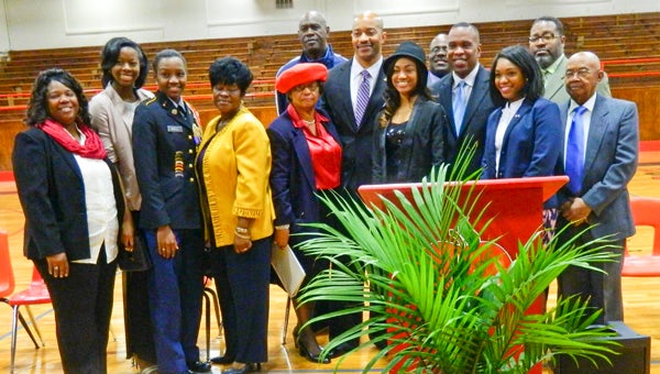Shirley Burnham / The Prentiss Headlight – The annual JeffDavis County celebration of the life of Dr. Martin Luther King, Jr. was held Monday in Prentiss. Program  speakers and personalities were (front l to r) Cammie Reese, Megan Daniels, Deanna Mikell, Ella Johnson, NAACP President Queen Esther Sutton, Guest Speaker Andre Heath, Rosalyn Ragsdale, Supt. of Ed. Ike Haynes, Dulanna Reese, David Bourne. (back l to r) Rev. Jessie Holloway, Grand Marshall Rev. Isaac Carter and Judge Ronnie Barnes.
