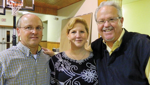 Shirley Burnham / The Prentiss Headlight – Covington-Jeff Davis Director of Missions Bro. Tommy Broom and wife Lynn pictured with Celebrity comedian, “Minister of Encouragement” Dr. Dennis Swanberg.