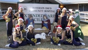 THE PRENTISS HEADLIGHT  / JENNIFER HALL  PCS Drill Team visited the nursing home here in Prentiss to give the patients a little Christmas spirit. They got together the week before and made around 60 homemade Christmas cards to hand out to the patients. They performed two dances while visiting. Members present to dance and join in on the activities were: Maidyn Rush, Josie Hall, Shelby Hodges, Corie Waites, Amber Graves, Ashley Smith, Hannah Riley, Sam Jones, Alyssa Ervin and Lacie Waites.