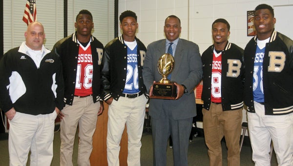 Karen Sanford / The Prentiss Headlight – Bassfield Yellowjackets Team Captains pictured ( l to r) Coach Lance Mancuso, C J Moore, Cornell Armstrong, Superintendent of Education Ike Haynes, Curtis Mikell and Alvin Moore.    