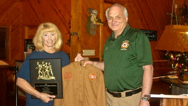 Karen Sanford / The Prentiss Headlight —Penny Anthony of the Oakvale Fire Department was recognized as the county-wide Firefighter of the Year at the 12th Annual JDC Firefighter Banquet held at the Country Fisherman last Tuesday night. Prentiss Fire Chief Howard Kelly presented her with a plaque and a firefighter jacket.