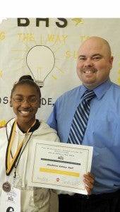 Shirley Burnham / The Prentiss Headlight—Shakira Hall represented JDC School District in the State Spelling Bee broadcast by PBS. Hall is shown here with her medal and certificate with BHS Principal John Daley.