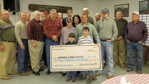 Shirley Burnham / The Prentiss Headlight—Directors of the Jeff Davis County Forestry Commission presented the Stuart family with a check for $16,500.