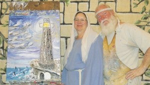 Shirley Burnham / THe Prentiss Headlight—Wade Burleigh completed this unique painting at Whitesand Baptist Church while his wife told of God’s great love for man.